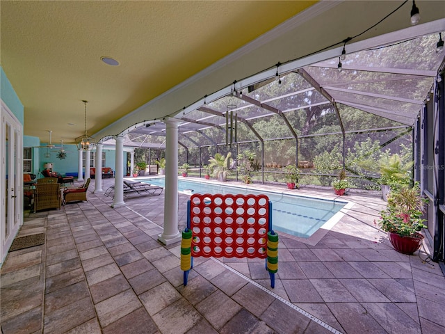 7427 20th St, Zephyrhills, FL 33540 - view of patio with an outdoor pool and a lanai