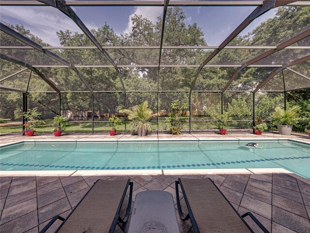 7427 20th St, Zephyrhills, FL 33540 - outdoor pool with a lanai and a patio area