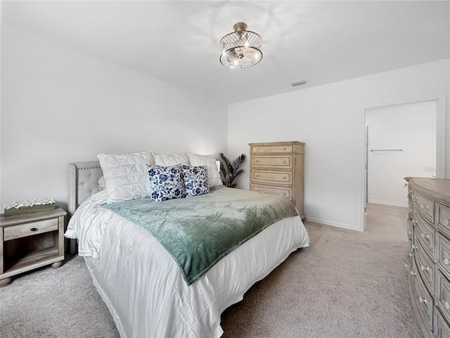 5336 Patano Loop, Palmetto, FL 34221 - bedroom featuring light carpet and baseboards