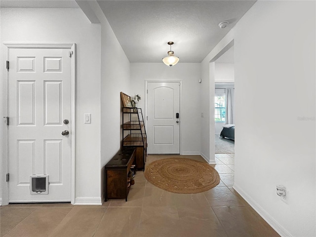 5336 Patano Loop, Palmetto, FL 34221 - foyer entrance with tile patterned floors and baseboards