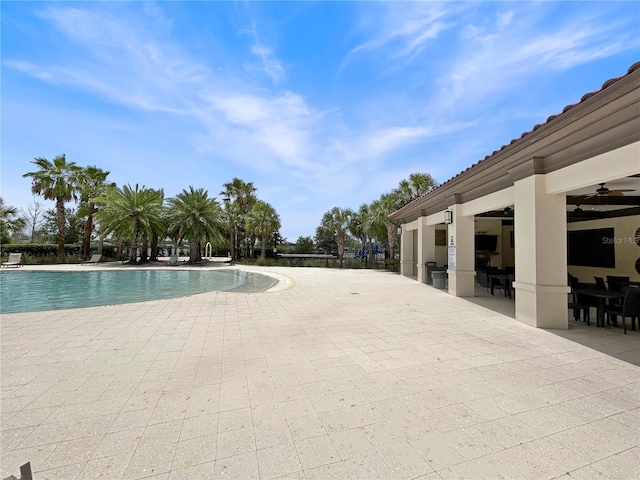 5336 Patano Loop, Palmetto, FL 34221 - community pool featuring a patio area and ceiling fan