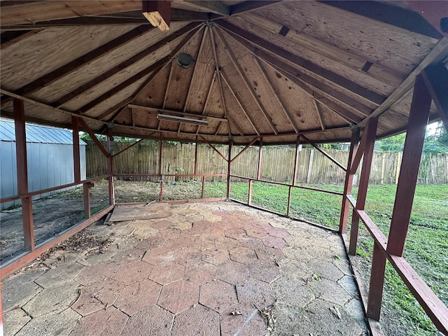 12009 Washington St, Seffner, FL 33584 - unfurnished sunroom with vaulted ceiling