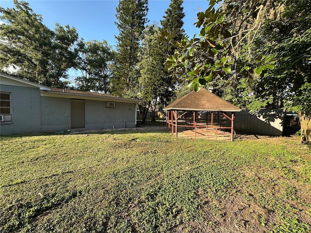 12009 Washington St, Seffner, FL 33584 - view of grassy yard with a gazebo