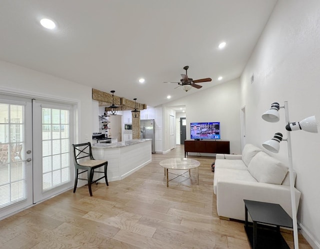 1548 Foxboro Dr, Palm Harbor, FL 34683 - living area with vaulted ceiling, light wood finished floors, a ceiling fan, and recessed lighting