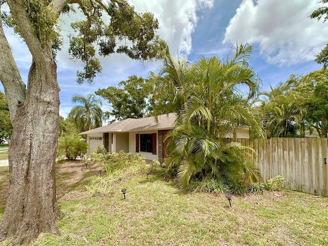 1548 Foxboro Dr, Palm Harbor, FL 34683 - view of front of home featuring a garage