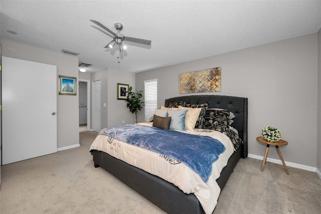 1115 Ashbourne Cir, Trinity, FL 34655 - bedroom featuring carpet, ceiling fan, and a textured ceiling