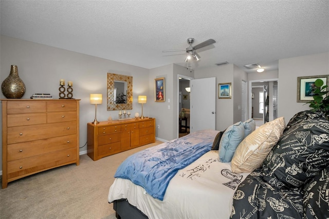 1115 Ashbourne Cir, Trinity, FL 34655 - bedroom with a textured ceiling, carpet floors, and a ceiling fan