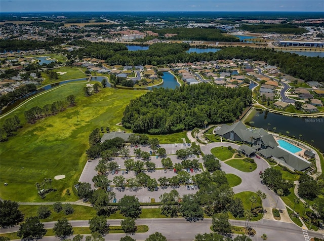 1115 Ashbourne Cir, Trinity, FL 34655 - aerial view of property and surrounding area featuring a large body of water, nearby suburban area, and a golf course