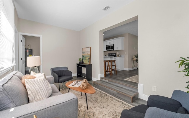 3907 W Walnut St, Tampa, FL 33607 - living area featuring wood finished floors and baseboards
