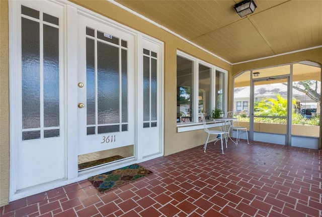 3611 W Bay To Bay Blvd, Tampa, FL 33611 - sunroom / solarium featuring wooden ceiling
