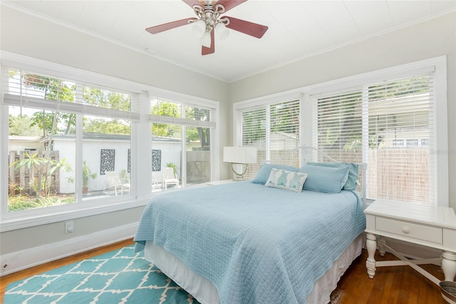 3611 W Bay To Bay Blvd, Tampa, FL 33611 - bedroom with wood finished floors, crown molding, and ceiling fan