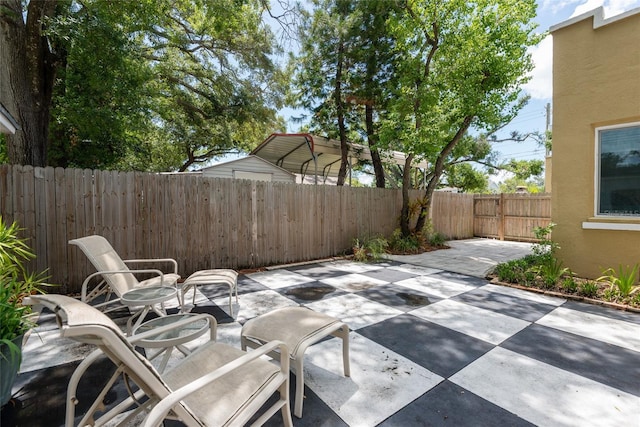 3611 W Bay To Bay Blvd, Tampa, FL 33611 - fenced backyard with a patio area