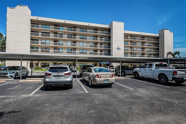 1324 Pasadena Ave S Unit 501, South Pasadena, FL 33707 - view of building exterior featuring covered parking