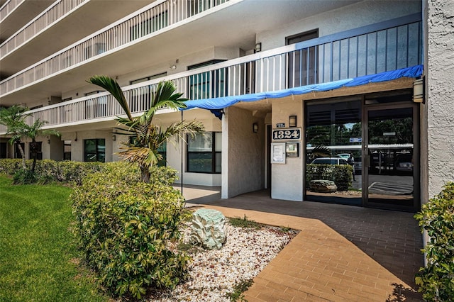 1324 Pasadena Ave S Unit 501, South Pasadena, FL 33707 - view of exterior entry with stucco siding