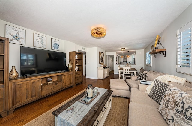 1324 Pasadena Ave S Unit 501, South Pasadena, FL 33707 - living room with dark wood-type flooring