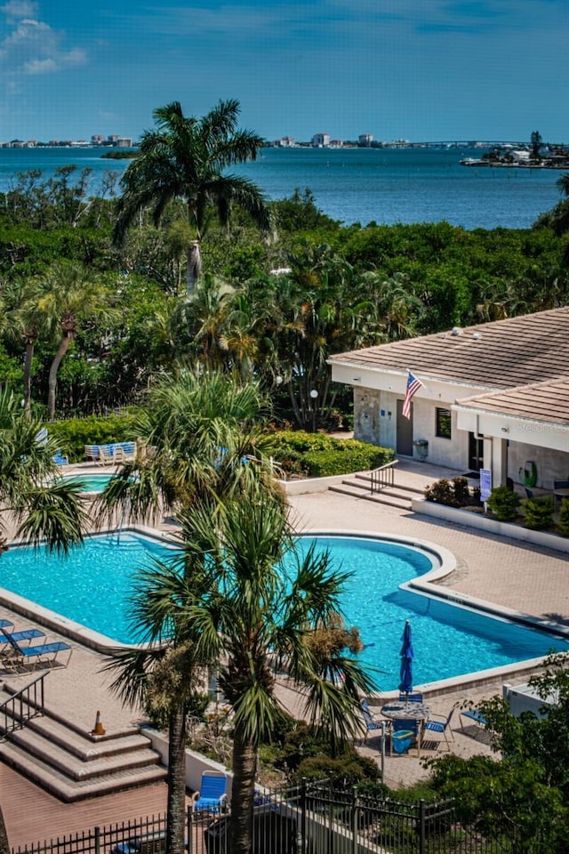 1324 Pasadena Ave S Unit 501, South Pasadena, FL 33707 - community pool with a patio area, a hot tub, and a water view
