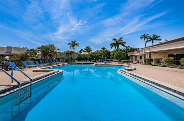 1324 Pasadena Ave S Unit 501, South Pasadena, FL 33707 - community pool with a patio area and ceiling fan