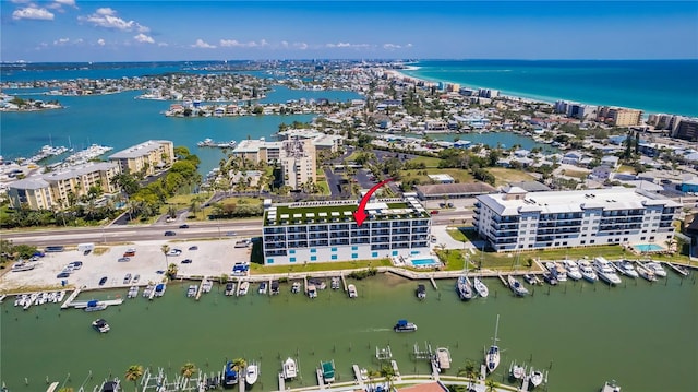 400 150th Ave Unit 504, Madeira Beach, FL 33708 - view of urban area with a marina and a large body of water