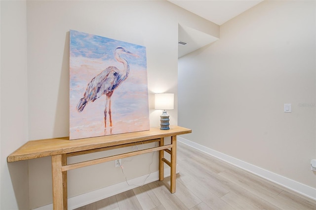 400 150th Ave Unit 504, Madeira Beach, FL 33708 - detailed view of wood finished floors and baseboards