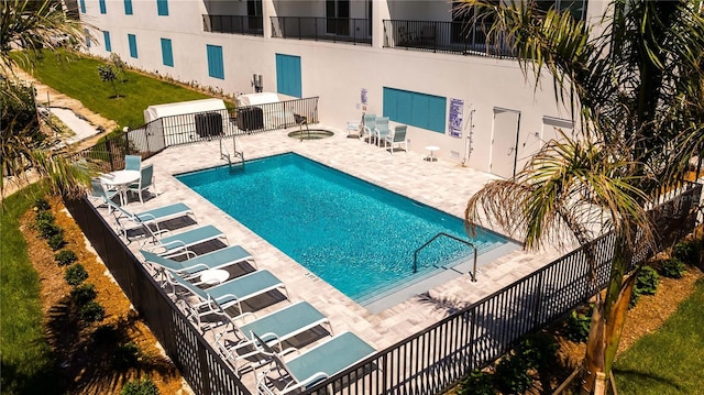 400 150th Ave Unit 504, Madeira Beach, FL 33708 - community pool featuring a patio