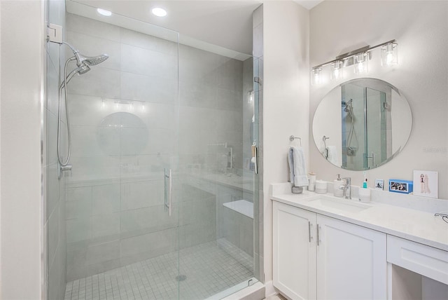 400 150th Ave Unit 504, Madeira Beach, FL 33708 - full bathroom with vanity, a shower stall, and recessed lighting