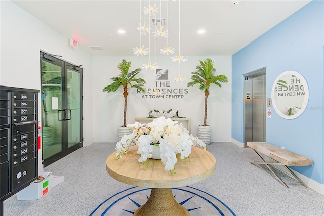 400 150th Ave Unit 504, Madeira Beach, FL 33708 - dining space featuring elevator, speckle patterned floor, and recessed lighting