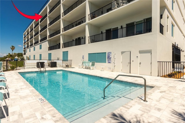400 150th Ave Unit 504, Madeira Beach, FL 33708 - community pool featuring a patio area