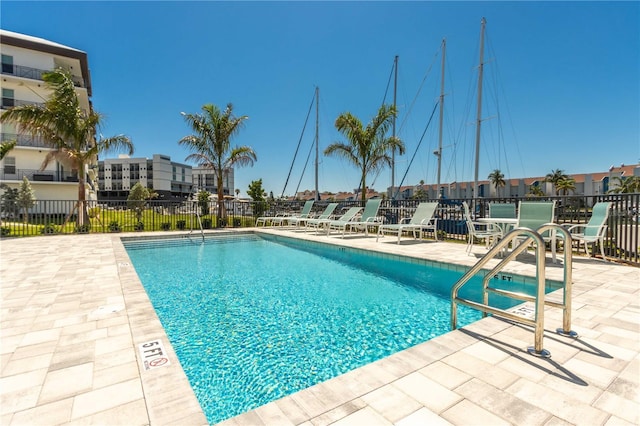 400 150th Ave Unit 504, Madeira Beach, FL 33708 - community pool featuring a patio