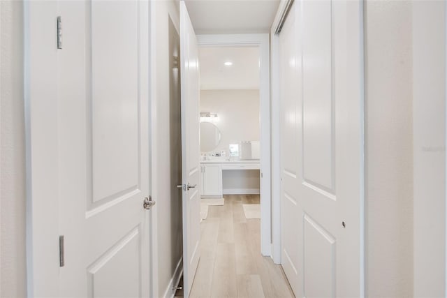 400 150th Ave Unit 504, Madeira Beach, FL 33708 - hallway featuring light wood-style floors and recessed lighting