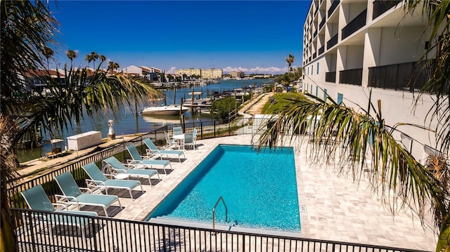 400 150th Ave Unit 504, Madeira Beach, FL 33708 - community pool featuring a patio area and a water view