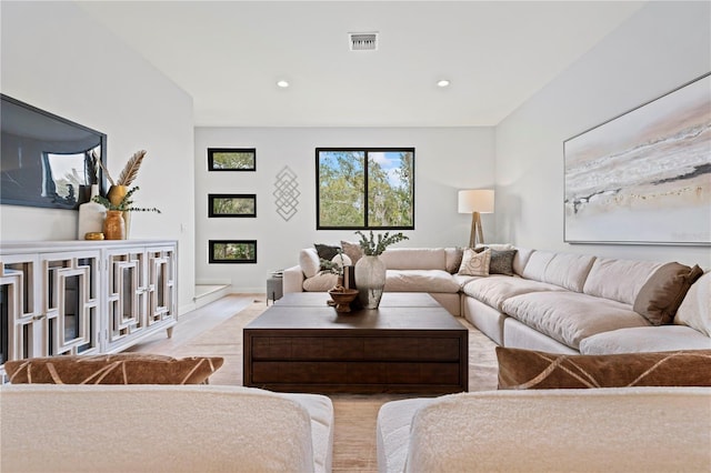 532 W Plaza Pl Unit 3, Tampa, FL 33602 - living area featuring recessed lighting, light wood-style flooring, and a glass covered fireplace