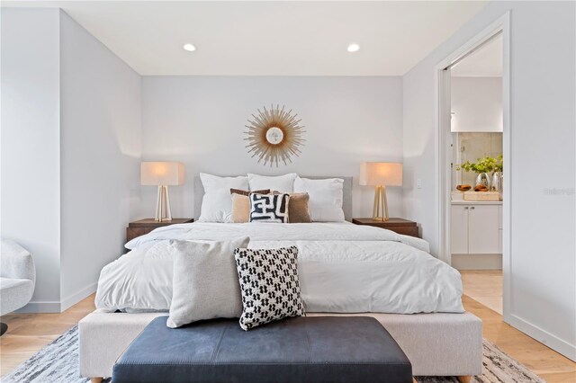 532 W Plaza Pl Unit 3, Tampa, FL 33602 - bedroom with light wood-type flooring, ensuite bathroom, and recessed lighting