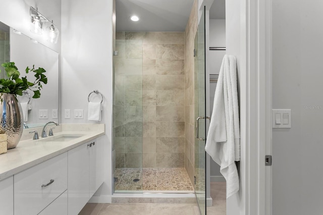532 W Plaza Pl Unit 3, Tampa, FL 33602 - full bathroom with vanity, a stall shower, tile patterned floors, and recessed lighting