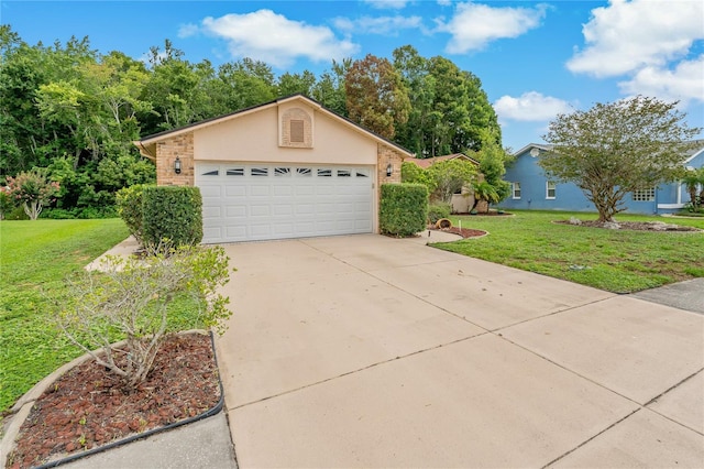 8671 Cypress Lakes Blvd, New Port Richey, FL 34653 - view of front facade with a garage, a front lawn, driveway, and stucco siding