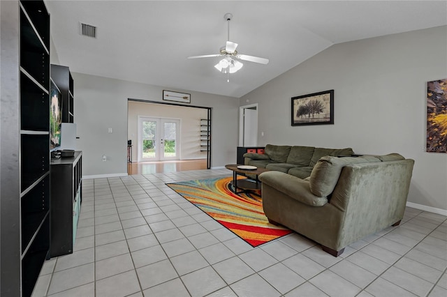 8671 Cypress Lakes Blvd, New Port Richey, FL 34653 - living room featuring ceiling fan, vaulted ceiling, light tile patterned floors, and french doors