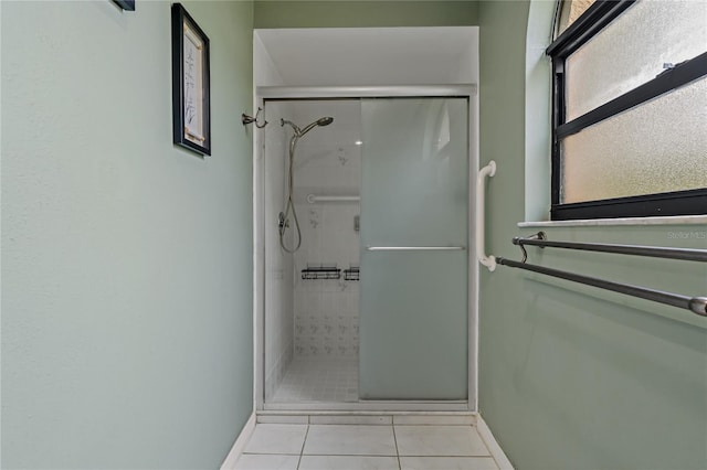 8671 Cypress Lakes Blvd, New Port Richey, FL 34653 - bathroom with a shower stall and tile patterned floors