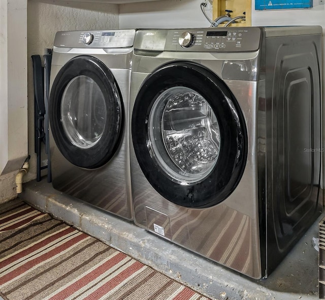 8671 Cypress Lakes Blvd, New Port Richey, FL 34653 - laundry area with washer and dryer