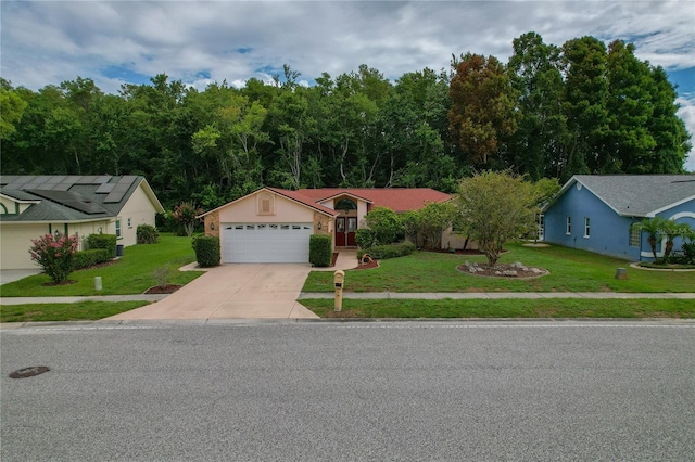 8671 Cypress Lakes Blvd, New Port Richey, FL 34653 - ranch-style house with driveway, an attached garage, and a front yard