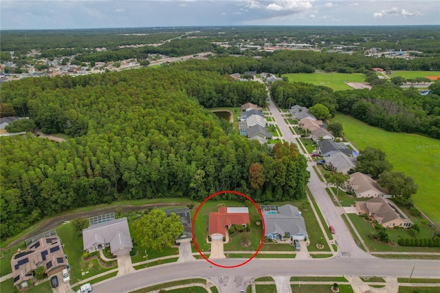 8671 Cypress Lakes Blvd, New Port Richey, FL 34653 - aerial view of property's location featuring nearby suburban area and a forest