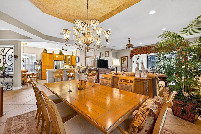 15744 Crystal Waters Dr, Wimauma, FL 33598 - dining space with light tile patterned flooring, ceiling fan, recessed lighting, plenty of natural light, and a chandelier