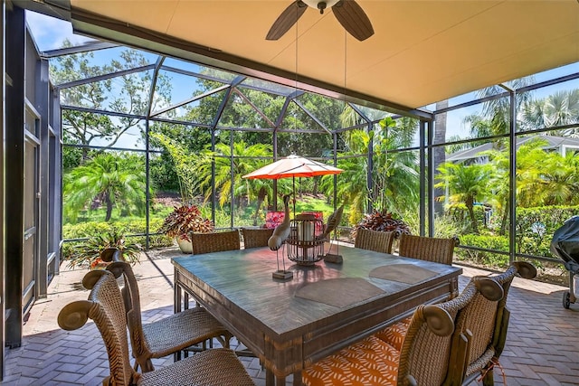 15744 Crystal Waters Dr, Wimauma, FL 33598 - sunroom with ceiling fan and outdoor dining space