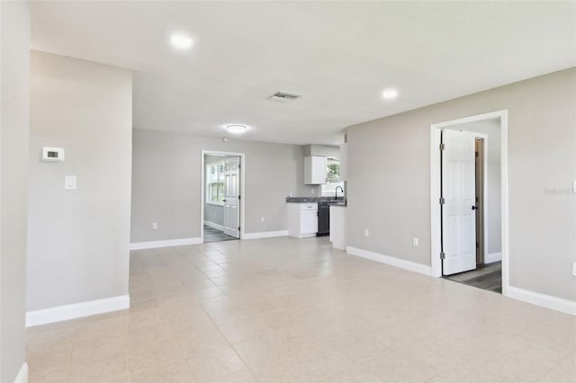 2902 Wheeler St, Bartow, FL 33830 - unfurnished living room with recessed lighting and baseboards