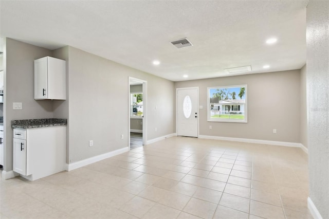 2902 Wheeler St, Bartow, FL 33830 - entryway with healthy amount of natural light, light tile patterned floors, and recessed lighting
