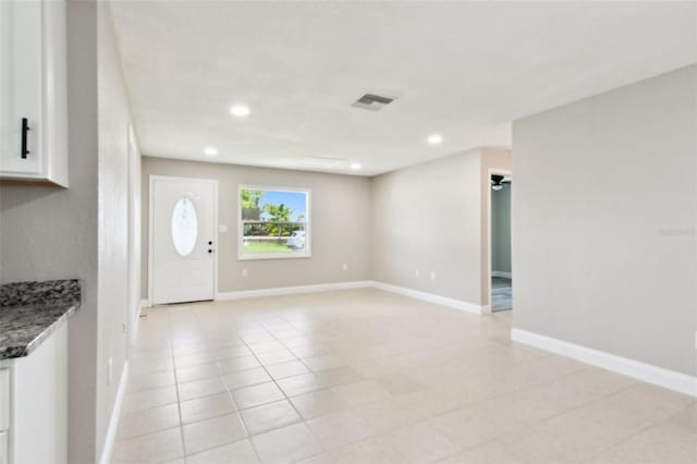 2902 Wheeler St, Bartow, FL 33830 - unfurnished living room featuring recessed lighting and light tile patterned floors