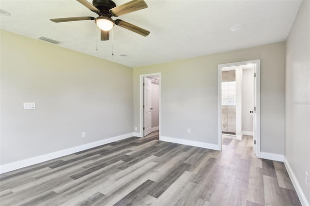2902 Wheeler St, Bartow, FL 33830 - spare room with wood finished floors and ceiling fan
