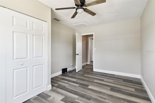 2902 Wheeler St, Bartow, FL 33830 - unfurnished bedroom with attic access, wood finished floors, and ceiling fan