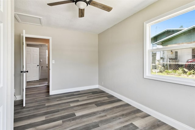 2902 Wheeler St, Bartow, FL 33830 - unfurnished room featuring attic access, wood finished floors, and a ceiling fan