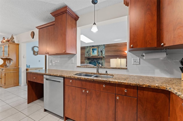 6289 107th Ave N, Pinellas Park, FL 33782 - kitchen with stainless steel dishwasher, decorative backsplash, light tile patterned flooring, light stone counters, and a textured ceiling