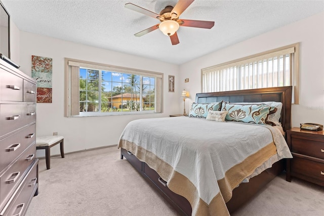 6289 107th Ave N, Pinellas Park, FL 33782 - bedroom featuring light colored carpet, a ceiling fan, and a textured ceiling