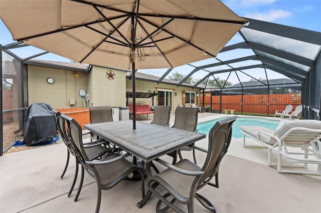 6289 107th Ave N, Pinellas Park, FL 33782 - view of patio featuring a lanai, grilling area, and outdoor dining space